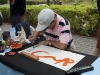 This guy was set up to do some calligraphy for the passersby.